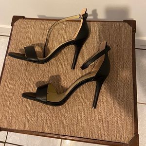 Never worn! Black ankle strap heels